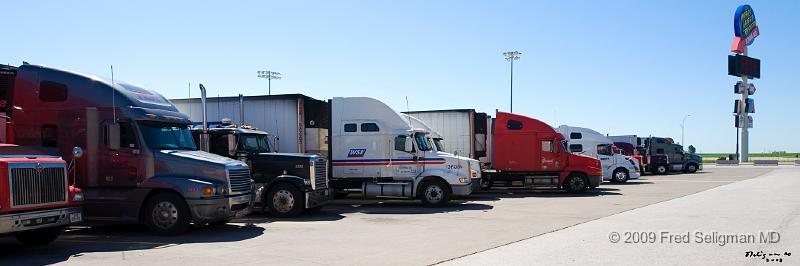 20080714_112602 D3 P 4200x1400.jpg - Trucks in parking lot Iowa-80 truck stop